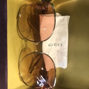 Gucci 63 mm gold rimmed sunglasses